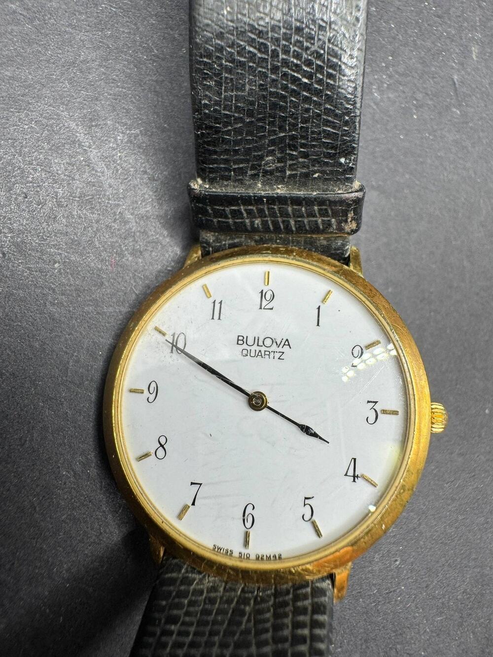Bulova Quartz Wristwatch Gold Tone White Dial Black Leather Band Vintage 510